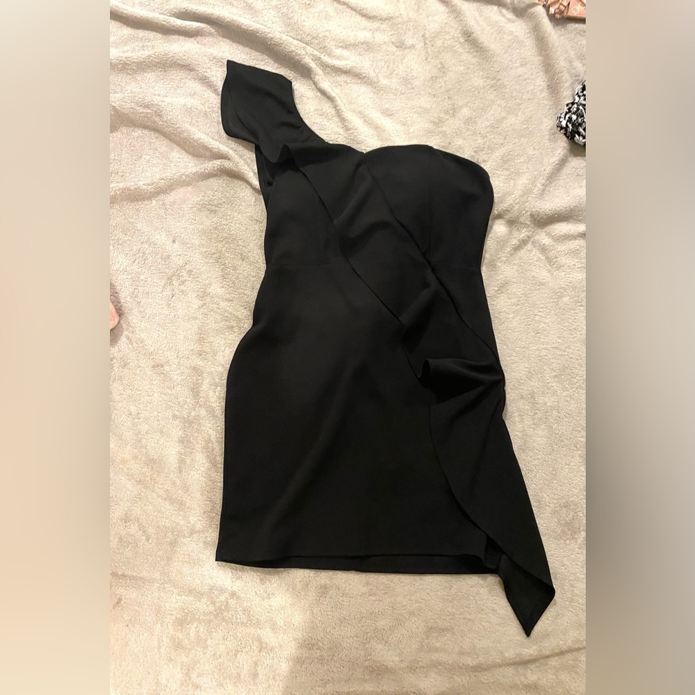 I am selling a black dress in a size Large.